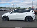 2025 Tesla Model Y — photo 14 of 19 | VIN 7SAYGDEE8SF304646
