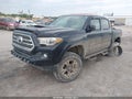2016 Toyota Tacoma — photo 2 of 17 | VIN 5TFAZ5CN5GX010216