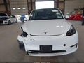 2024 Tesla Model Y — photo 19 of 23 | VIN 7SAYGAEEXRF170652