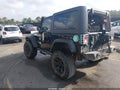 2016 Jeep Wrangler — photo 3 of 12 | VIN 1C4GJWAG1GL109098