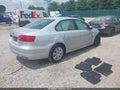 2011 Volkswagen Jetta — photo 4 of 16 | VIN 3VWDX7AJ1BM056202