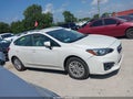2018 Subaru Impreza — photo 13 of 16 | VIN 4S3GTAD65J3733820