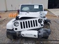 2016 Jeep Wrangler Unlimited — photo 12 of 16 | VIN 1C4BJWEGXGL183141