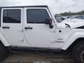 2016 Jeep Wrangler Unlimited — photo 13 of 16 | VIN 1C4BJWEGXGL183141