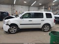 2015 Honda Pilot — photo 14 of 16 | VIN 5FNYF4H22FB045790