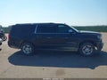 2016 Chevrolet Suburban — photo 13 of 17 | VIN 1GNSKJKC8GR327372