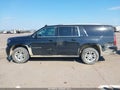 2016 Chevrolet Suburban — photo 14 of 17 | VIN 1GNSKJKC8GR327372