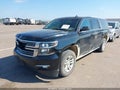 2016 Chevrolet Suburban — photo 2 of 17 | VIN 1GNSKJKC8GR327372