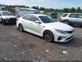2019 Kia Optima — photo 1 of 17 | VIN 5XXGT4L30KG346523