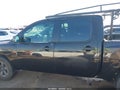 2010 Nissan Titan — photo 13 of 15 | VIN 1N6BA0EK1AN318131