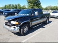 2001 GMC Sierra 1500 — photo 2 of 13 | VIN 2GTEK19TX11343116