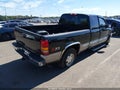 2001 GMC Sierra 1500 — photo 4 of 13 | VIN 2GTEK19TX11343116