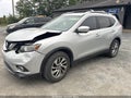 2015 Nissan Rogue — photo 2 of 16 | VIN 5N1AT2MT7FC852070