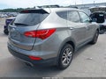 2014 Hyundai Santa Fe — photo 4 of 19 | VIN 5XYZU3LA9EG214567