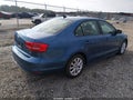 2015 Volkswagen Jetta — photo 4 of 11 | VIN 3VWD17AJ1FM307131