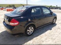 2009 Nissan Versa — photo 4 of 17 | VIN 3N1BC11E89L496992
