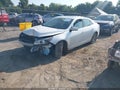 2015 Chevrolet Malibu — photo 2 of 17 | VIN 1G11F5SL7FF254388