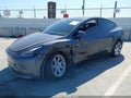 2023 Tesla Model Y — photo 2 of 17 | VIN 7SAYGDEE4PA192979