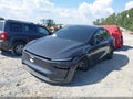 2026 Tesla Model Y — photo 2 of 17 | VIN 7SAYGDEE6TA590429
