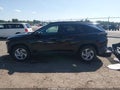 2022 Hyundai Tucson — photo 15 of 17 | VIN 5NMJBCAE0NH149252