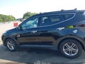 2017 Hyundai Santa Fe — photo 14 of 16 | VIN 5NMZUDLB9HH002969