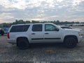 2010 Chevrolet Suburban 1500 — photo 13 of 16 | VIN 1GNUKHE31AR216828
