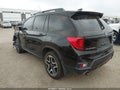 2023 Honda Passport — photo 3 of 15 | VIN 5FNYF8H04PB012393