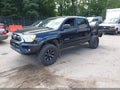 2013 Toyota Tacoma — photo 2 of 16 | VIN 3TMLU4EN8DM106132