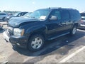 2012 Chevrolet Suburban — photo 2 of 16 | VIN 1GNSKJE73CR244487