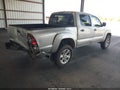 2009 Toyota Tacoma — photo 4 of 20 | VIN 3TMJU62N89M090920