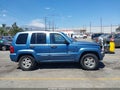 2004 Jeep Liberty — photo 14 of 17 | VIN 1J4GK58K44W147446