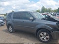 2011 Honda Pilot — photo 13 of 16 | VIN 5FNYF4H64BB089559