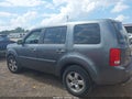 2011 Honda Pilot — photo 14 of 16 | VIN 5FNYF4H64BB089559