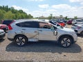 2016 Honda CR-V — photo 13 of 16 | VIN 5J6RM4H98GL009442