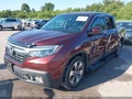 2019 Honda Ridgeline — photo 2 of 16 | VIN 5FPYK2F62KB000842