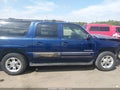 2003 GMC Yukon XL — photo 13 of 16 | VIN 1GKEC16TX3J144226