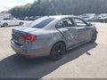 2014 Volkswagen Jetta — photo 4 of 16 | VIN 3VW4T7AJ6EM214713