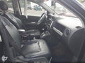 2014 Jeep Compass — photo 5 of 15 | VIN 1C4NJCCB2ED572866
