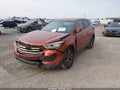2015 Hyundai Santa Fe — photo 2 of 17 | VIN 5XYZT3LB1FG283573