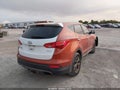 2015 Hyundai Santa Fe — photo 4 of 17 | VIN 5XYZT3LB1FG283573