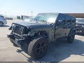 2021 Jeep Wrangler Unlimited — photo 2 of 19 | VIN 1C4HJXDN0MW719184