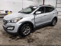 2016 Hyundai Santa Fe — photo 2 of 20 | VIN 5XYZU3LB4GG343523