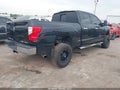 2017 Nissan Titan — photo 4 of 17 | VIN 1N6BA1F3XHN572881
