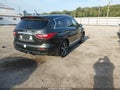 2013 Infiniti JX35 — photo 4 of 16 | VIN 5N1AL0MM6DC310548