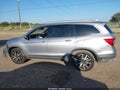 2020 Honda Pilot — photo 14 of 16 | VIN 5FNYF5H63LB025228