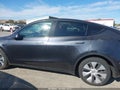 2024 Tesla Model Y — photo 13 of 15 | VIN 7SAYGDEE2RF068604