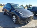 2024 Tesla Model Y — photo 1 of 15 | VIN 7SAYGDEE2RF068604