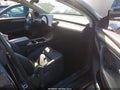 2024 Tesla Model Y — photo 5 of 15 | VIN 7SAYGDEE2RF068604