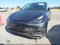 2024 Tesla Model Y — photo 6 of 15 | VIN 7SAYGDEE2RF068604
