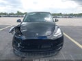 2023 Tesla Model Y — photo 11 of 15 | VIN 7SAYGDEE7PA156607